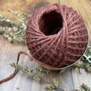A picture of a red twine ball