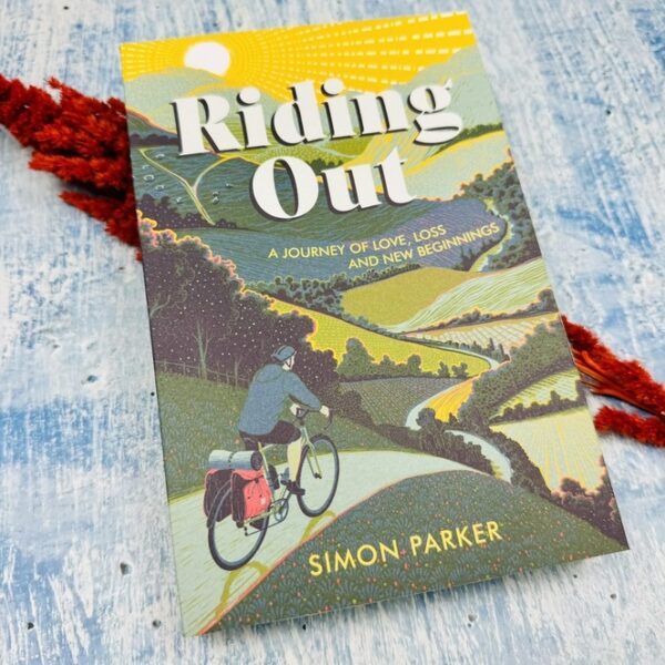 A picture of the riding our book by Simon Parker that is included in the Mini Cyclist Gift Box.