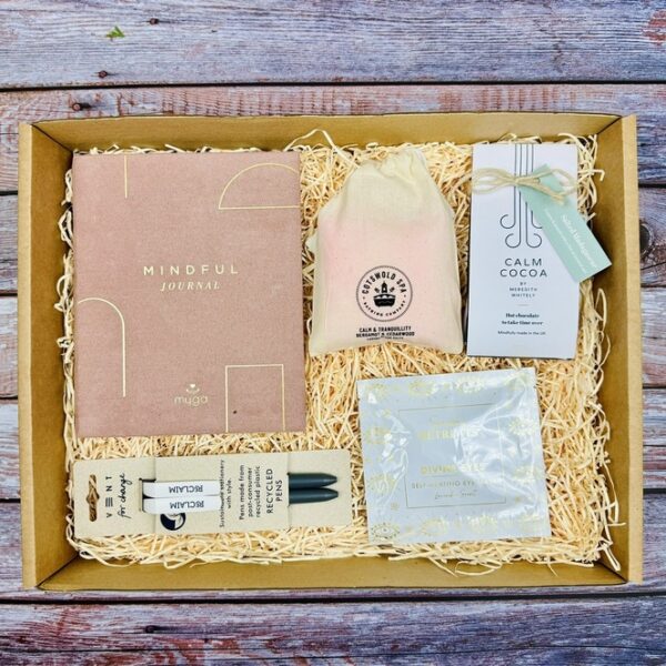 A picture of the mindfulness gifts for her that are included i in the Women's Headspace Gift box and presented in MindFill packaging.