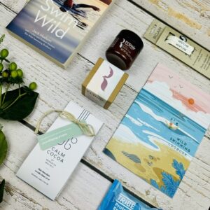 A picture of the range of gifts for wild swimmers which are part of the Wild Swimmers Gift Box.