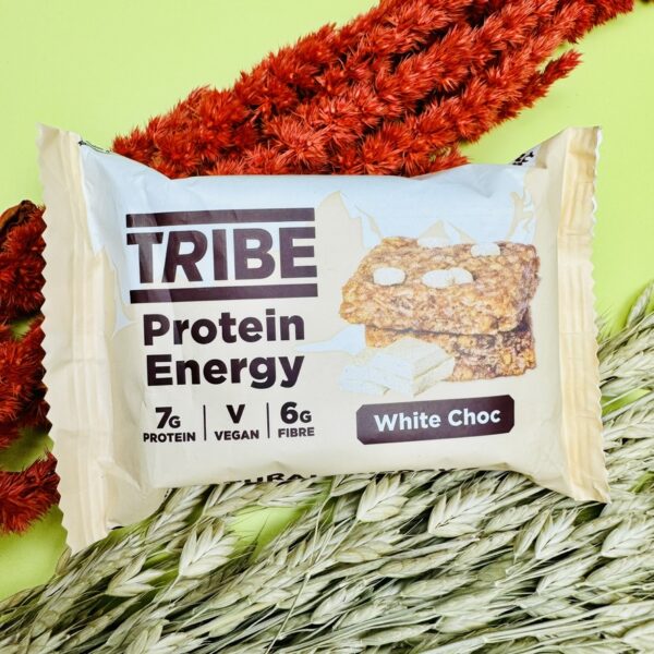 A picture of the Tribe White Choc proties bar that is included in the Walkers Wellness Gift Hamper.