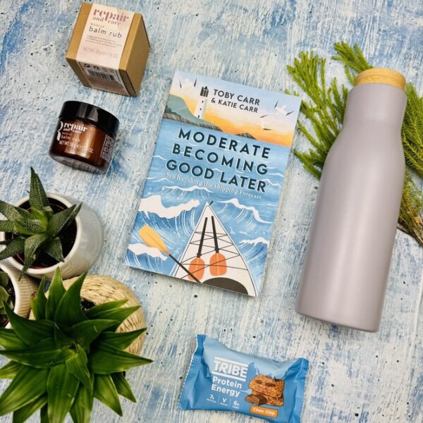 A picture of the range of products included in the Kayaking Wellness Box. A kayak gift for those who love the open water.