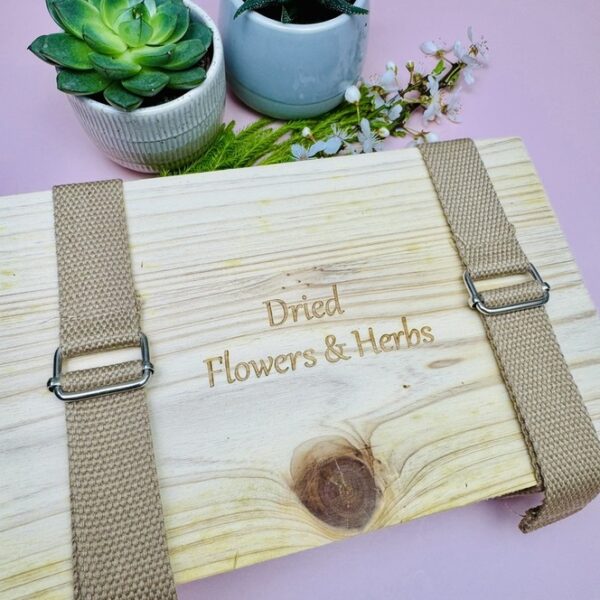 A picture of the flower press that is included in the Botanical Artist Gift Box