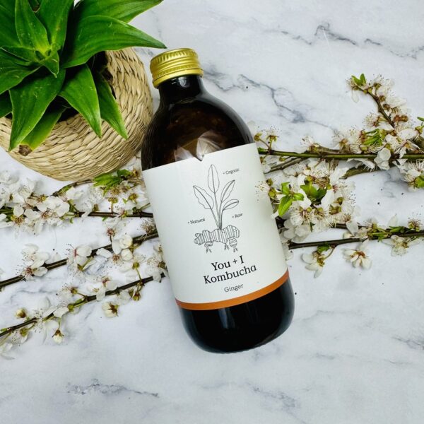 A picture of the You + I Ginger Kombucha that is included in the Yoga Treat Gift Box