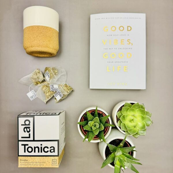 A picture of the items included in the Positivity Wellness Gift Box. A perfect positivity gift box.