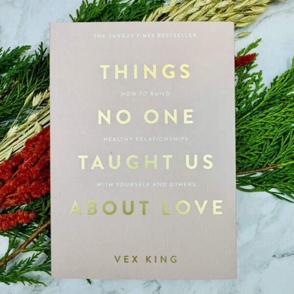 A picture of the The Things that No One Taught us about Love Book that is included Positivity & Self-Care Box