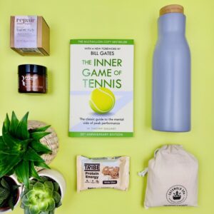 A picture of a tennis player gift that includes products to inspire positive wellness.