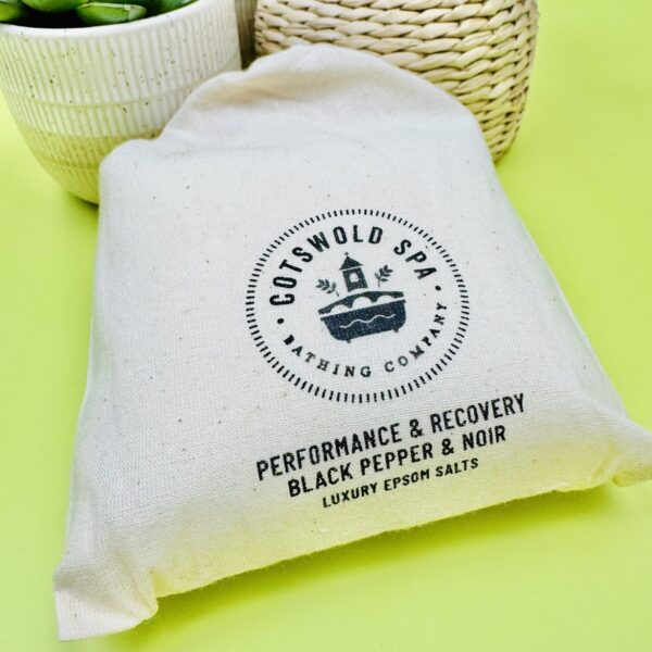 A picture of the Cotswold Spa Performance & Recover bath salts that are included in the Tennis Wellness & Recovery Box