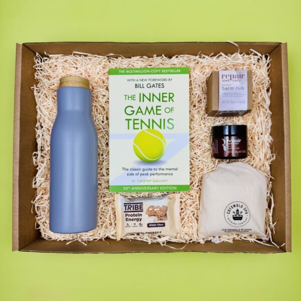 A picture of the range of products that are included in the Tennis Wellness & Recovery Box and presented in MindFill packaging. A tennis player gift perfect for birthdays.