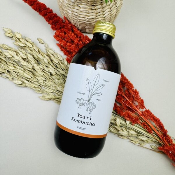 A picture of the You + I Ginger Kombucha that is included in the Mindful Tennis Performance Box