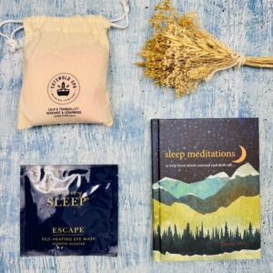A sleep gift set for her, this is a picture of the range of products that are included in the Sleep Meditation Wellness Box.