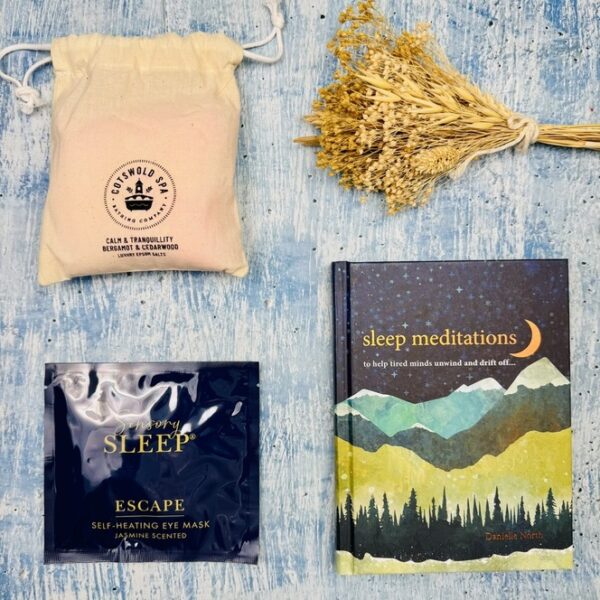 A sleep gift set for her, this is a picture of the range of products that are included in the Sleep Meditation Wellness Box.