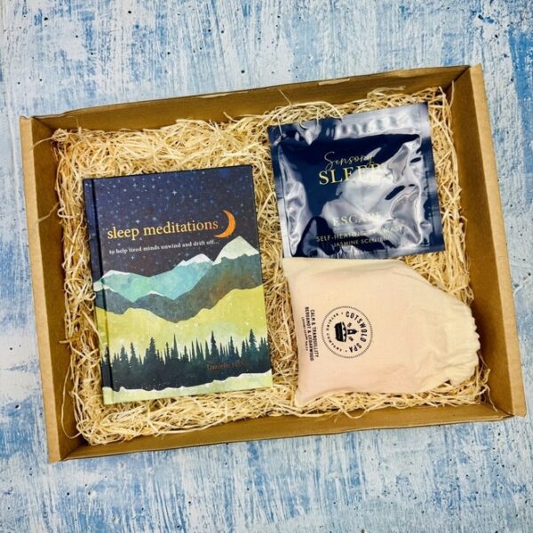 A picture of the range of products that are included in the Sleep Meditation Wellness Box that are presented in MindFill packaging. A perfect sleep gift set for her.