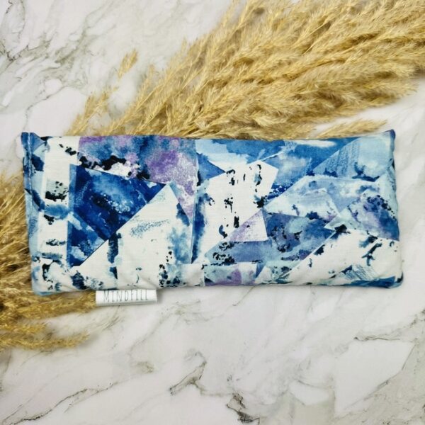 A picture of the sleep mask included in the Evening Wind Down Reflection Box