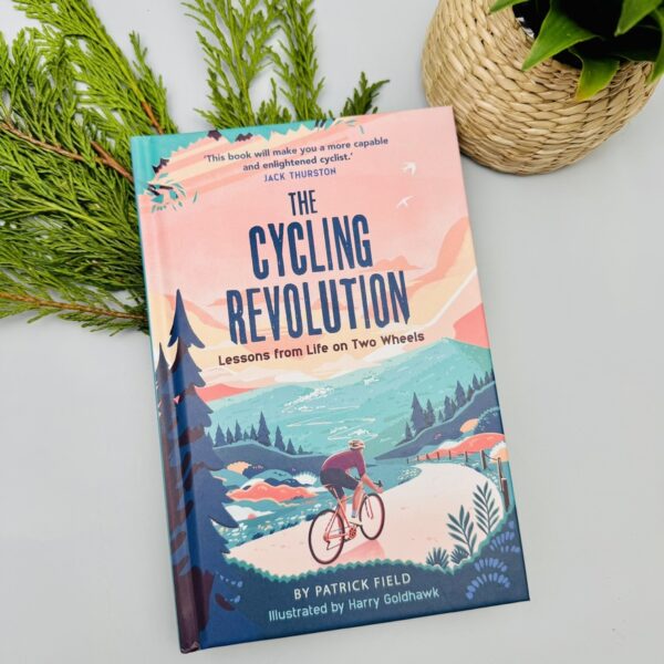 A picture of the Cycling Revolution Book that is included in the Nootropics Cyclist Wellnesss Box