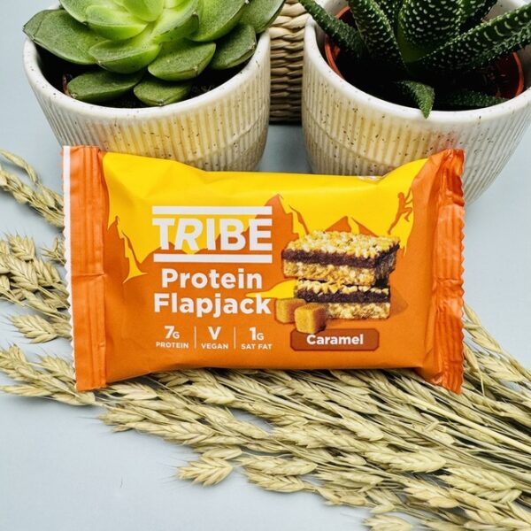 A picture of the Tribe protien flapjack that is inlcuded in the Run Well Gift Box